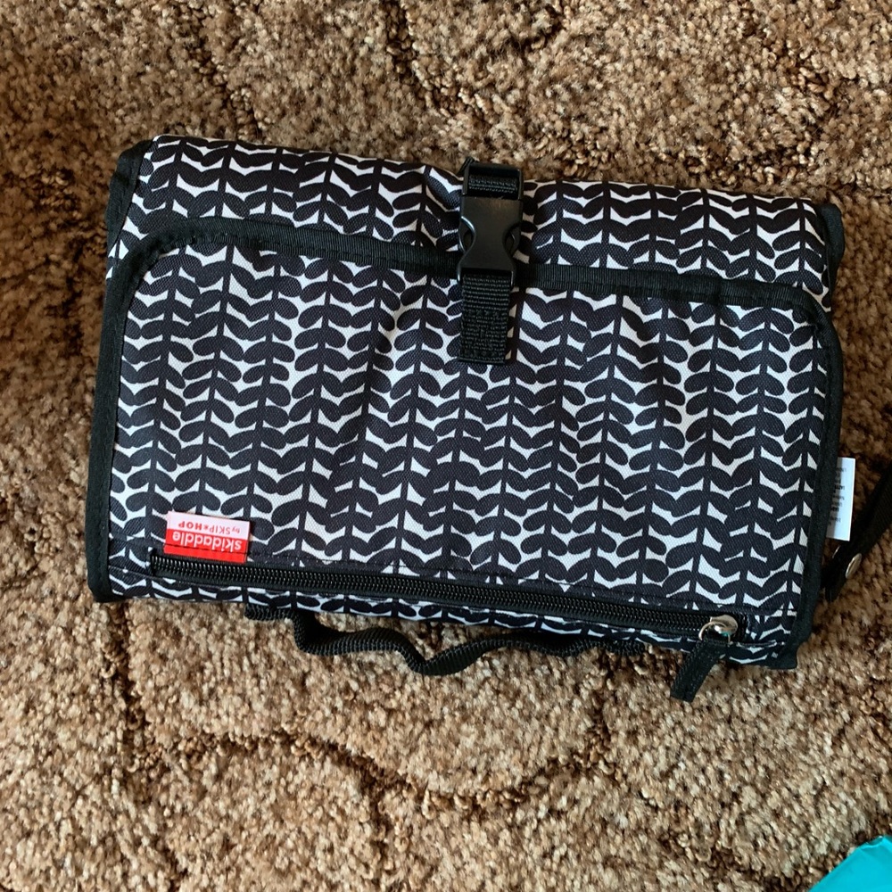 Portable diaper changing mat.